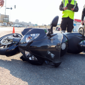 broken motorcycle on the road accident site