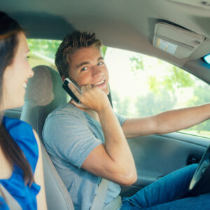 teen driving while talking on phone