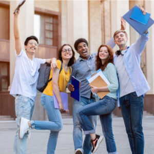 students celebrating that they got a scholarship