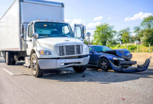 Car and commercial vehicle accident on the road